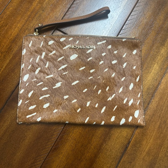 Michael Kors Tan and White Patterned Wristlet - Picture 1 of 2